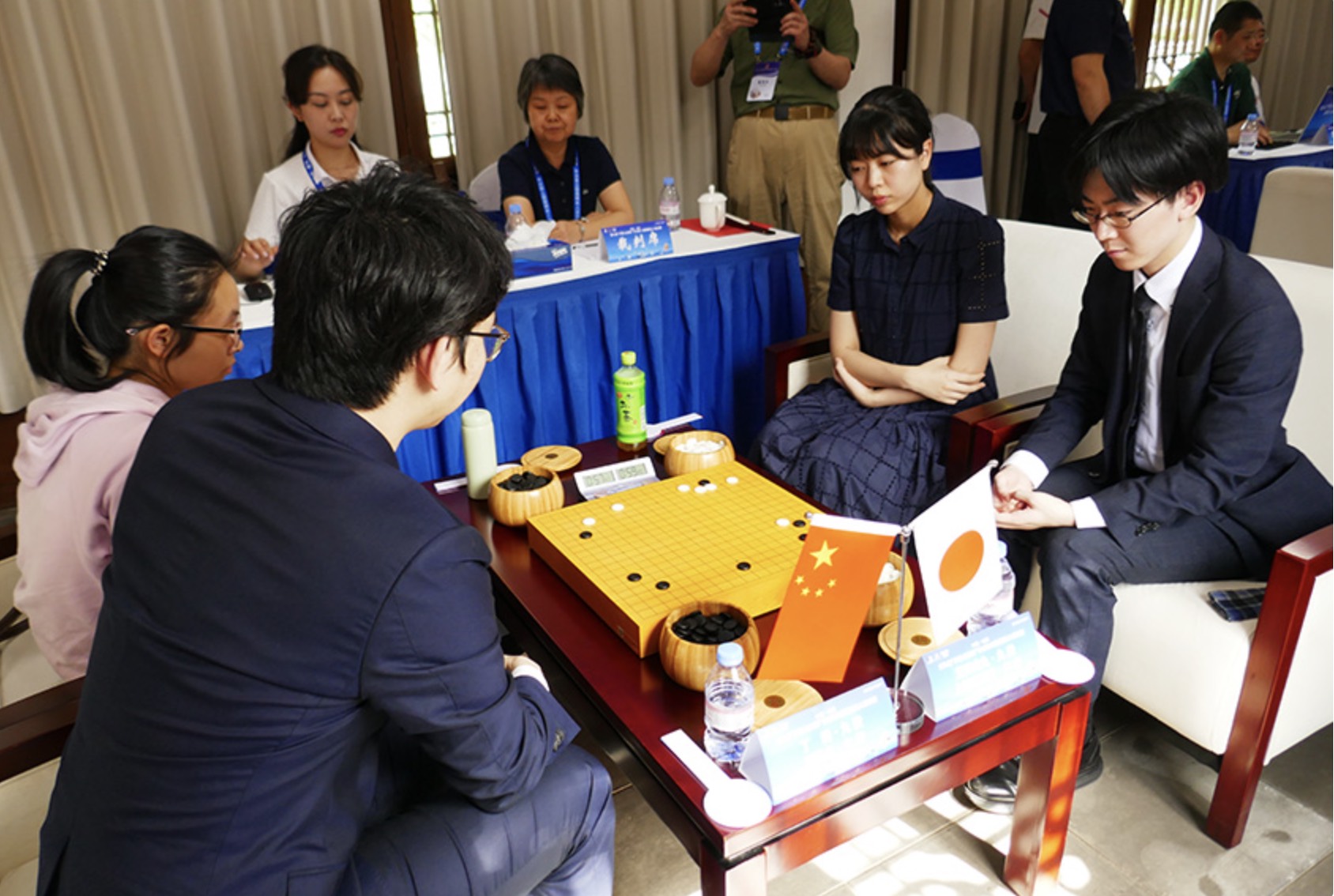 丁・周ペア 勝利